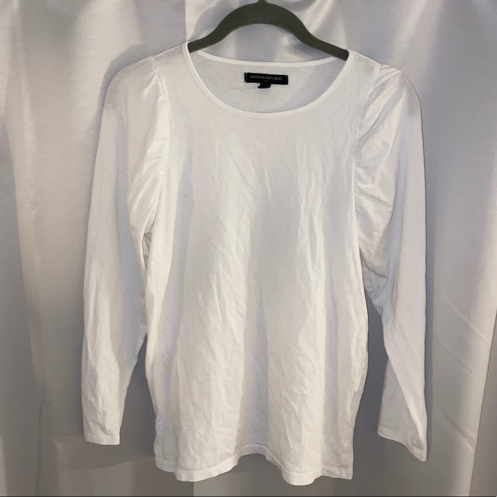 Long sleeve, ruffled shoulder shirt